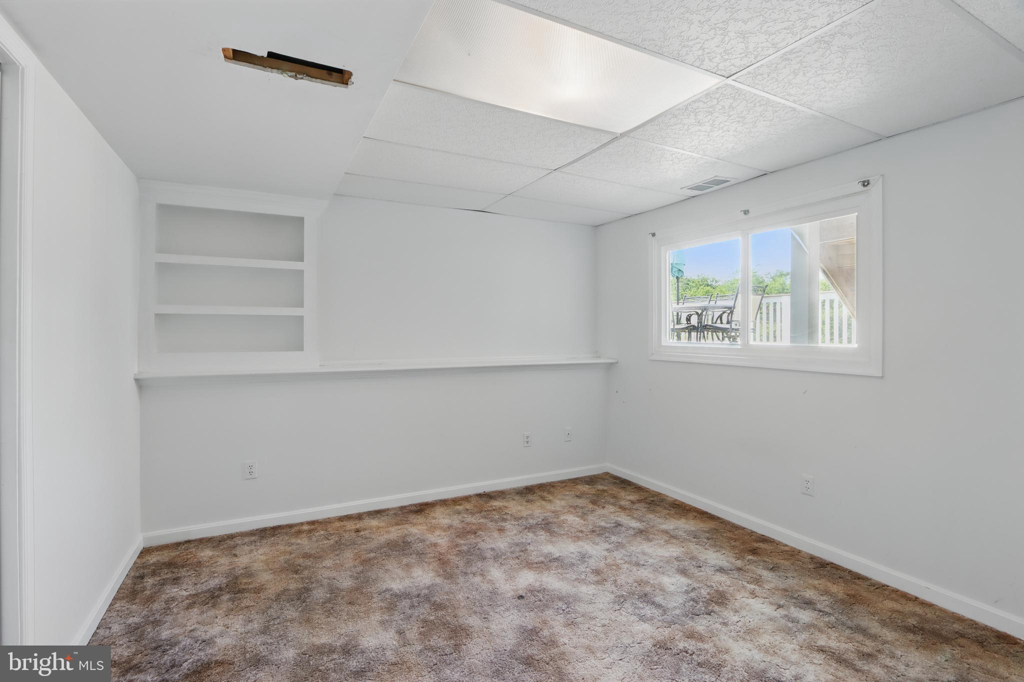 13228 Jesse Smith Road Mount Airy, MD 21771 - Photo 36 of 47 an empty room with a empty space and a window