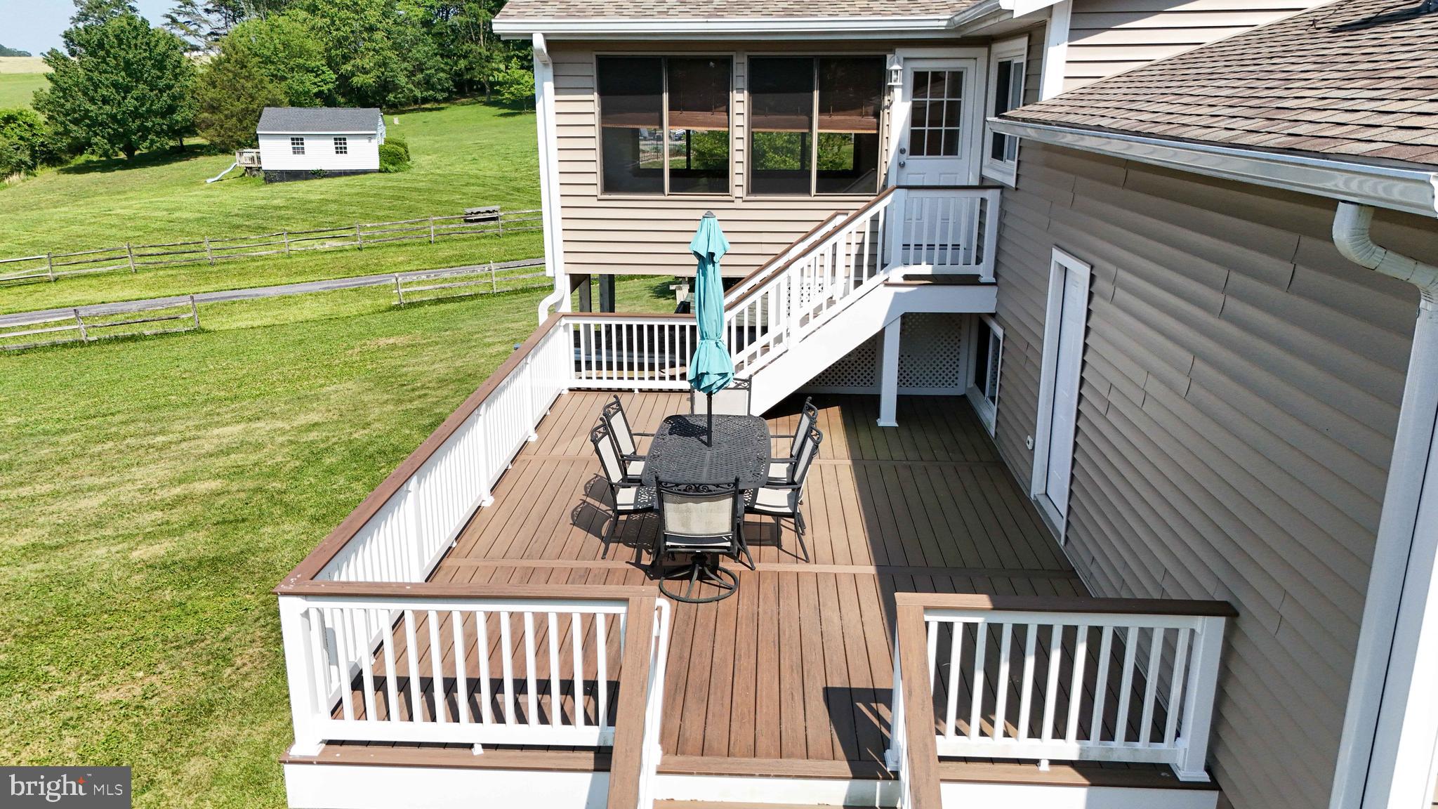 13228 Jesse Smith Road Mount Airy, MD 21771 - Photo 40 of 47 a view of a house with backyard and deck