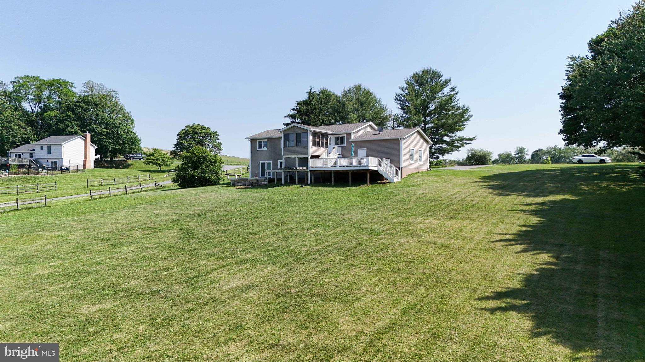 13228 Jesse Smith Road Mount Airy, MD 21771 - Photo 44 of 47 a front view of a house with a yard