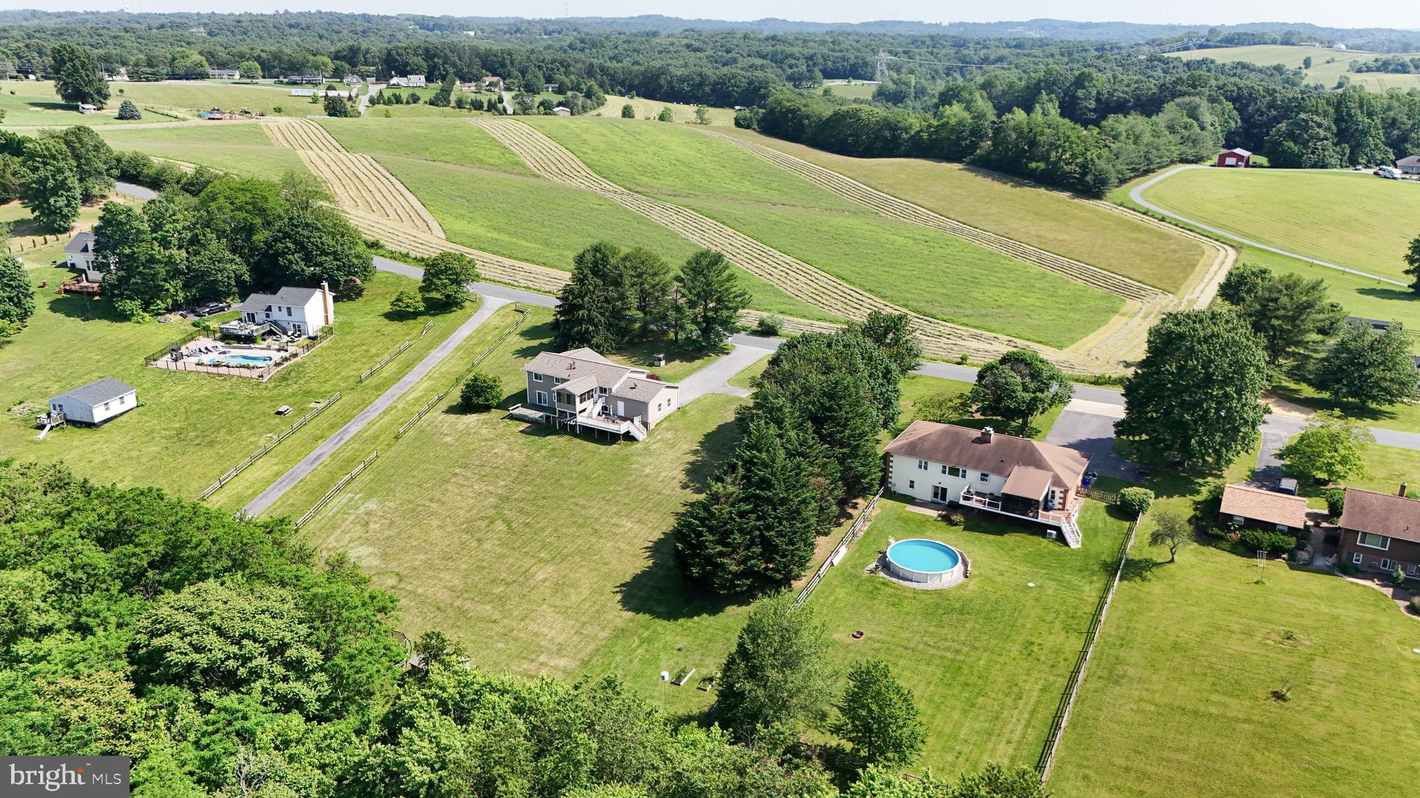 13228 Jesse Smith Road Mount Airy, MD 21771 - Photo 46 of 47 an aerial view of residential houses with outdoor space and river view