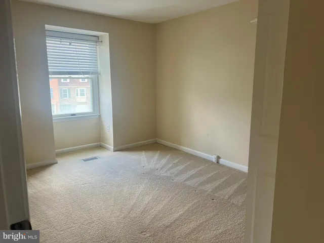 an empty room with a window