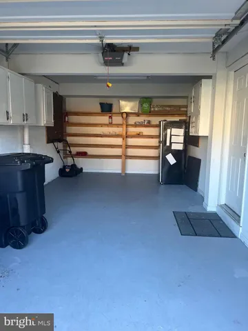 a view of livingroom with furniture and staircase