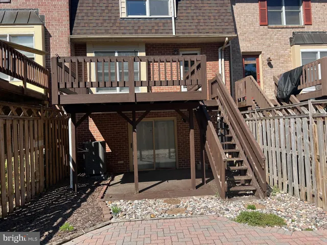 a view of a house with entrance gate