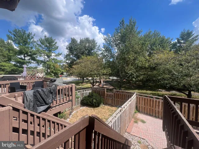 a view of balcony with furniture
