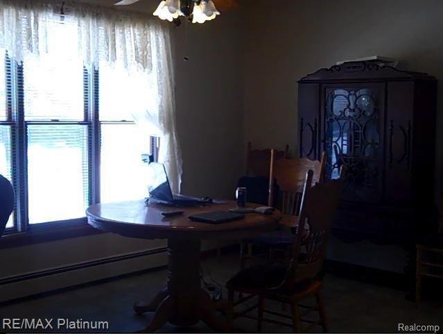 5588 North Latson Road Howell, MI 48855 - Photo 11 of 28 Latson Dining.jpg