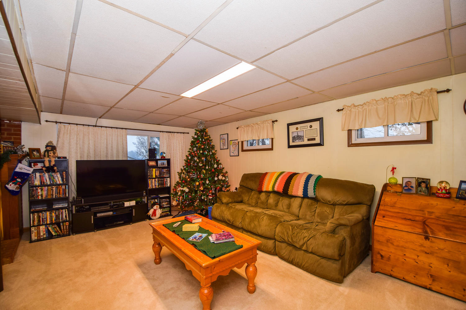 544 Olney Road Vinton, VA 24179 - Photo 13 of 23 a living room with furniture and a flat screen tv