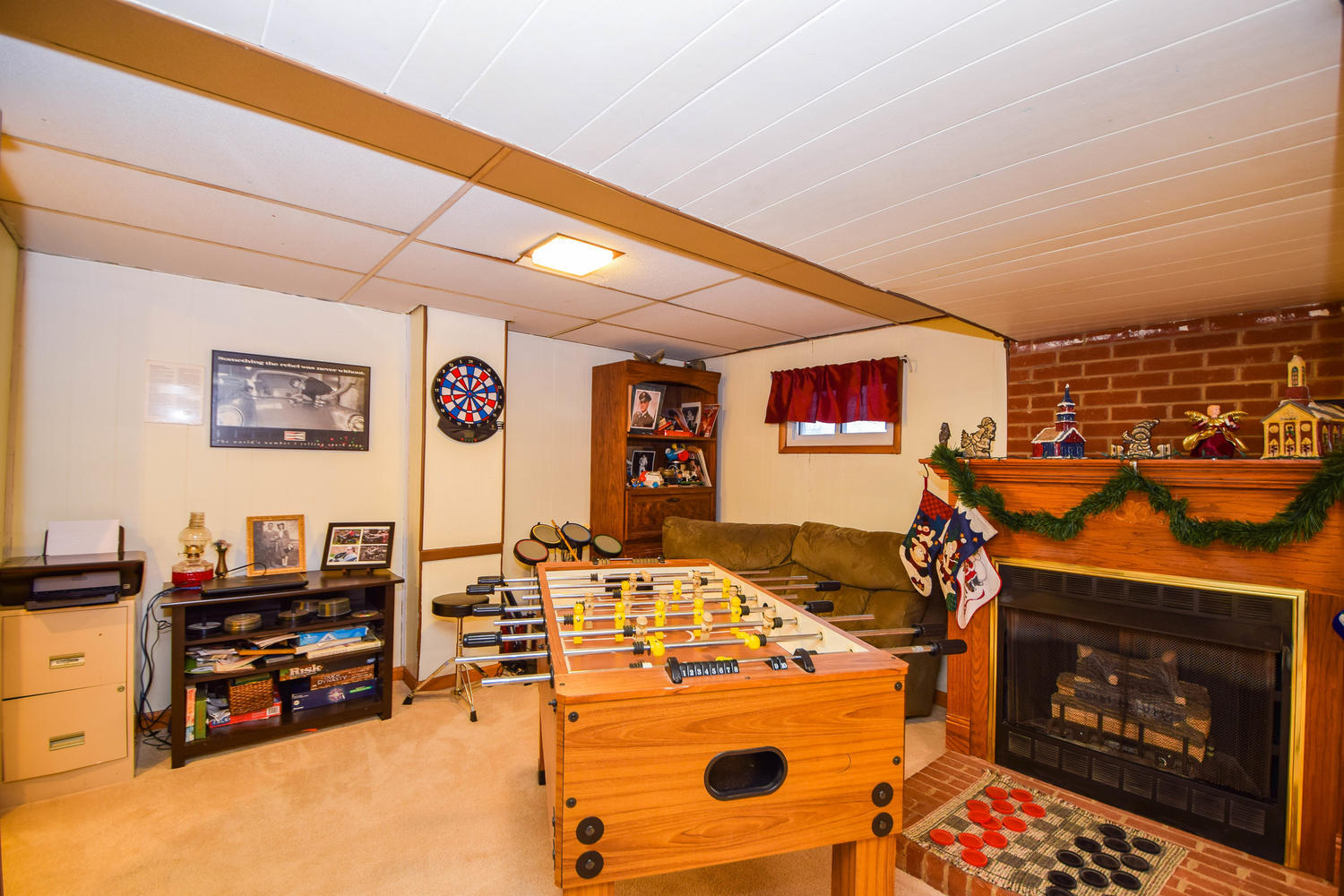 544 Olney Road Vinton, VA 24179 - Photo 15 of 23 a living room with furniture a flat screen tv and a fireplace