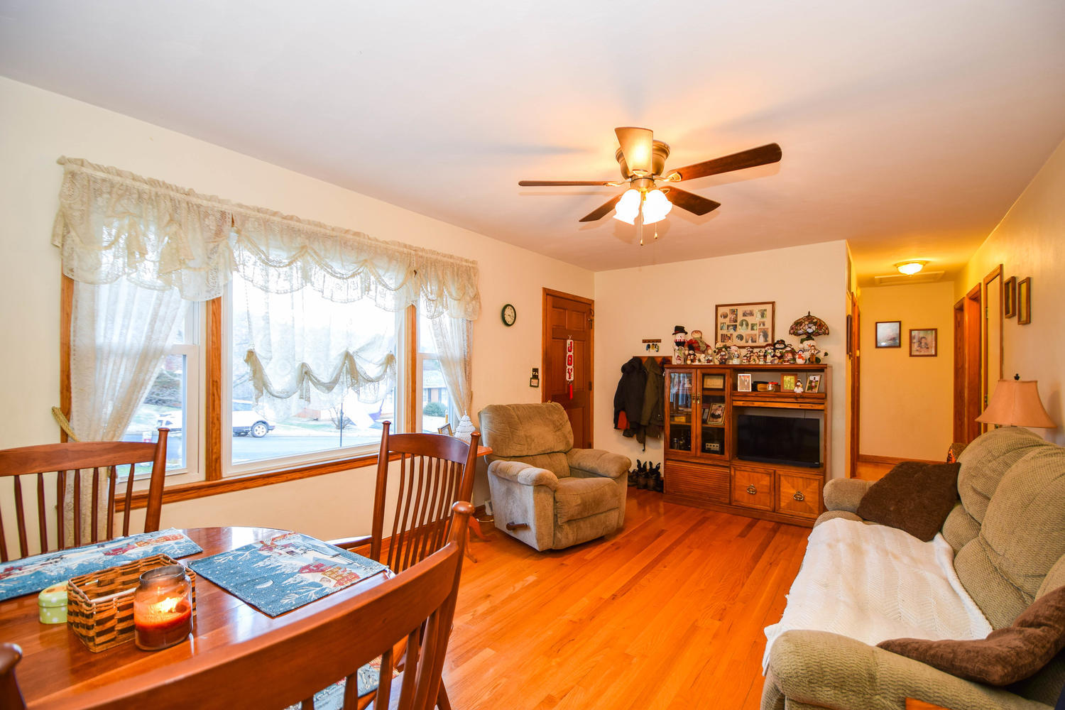 544 Olney Road Vinton, VA 24179 - Photo 4 of 23 a living room with furniture fireplace and a large window