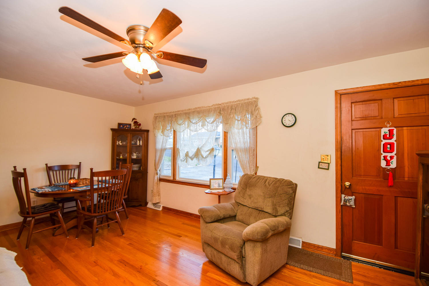 544 Olney Road Vinton, VA 24179 - Photo 5 of 23 a living room with furniture a ceiling fan and a large window