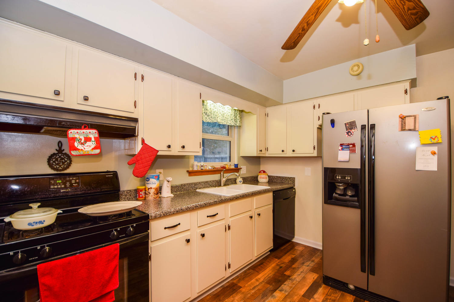 544 Olney Road Vinton, VA 24179 - Photo 7 of 23 a kitchen with stainless steel appliances granite countertop a refrigerator and a stove