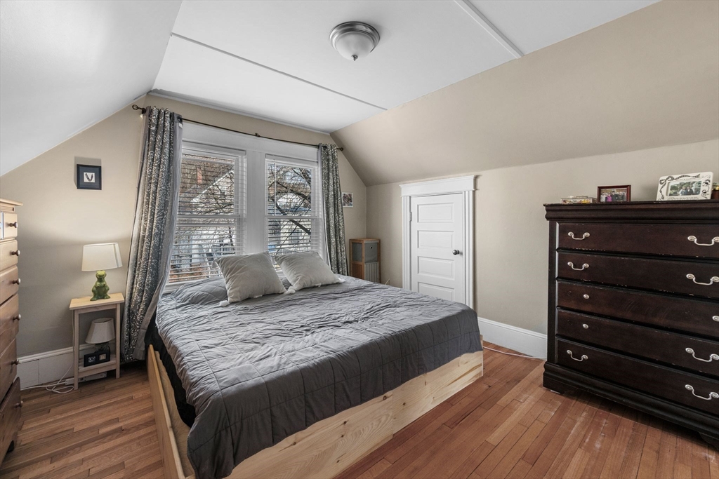 34 Moffatt Road, Unit 34 Salem, MA 01970 - Photo 13 of 23 a bedroom with a large bed and a dresser