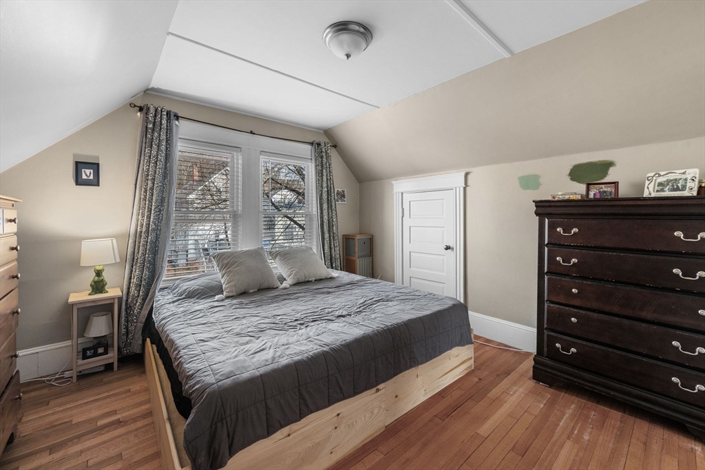 34 Moffatt Road, Unit 34 Salem, MA 01970 - Photo 14 of 23 a bedroom with a large bed and a dresser