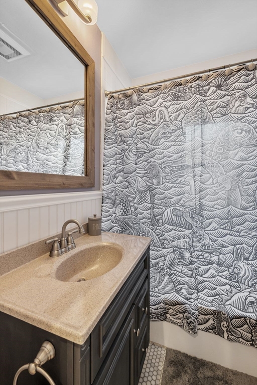 34 Moffatt Road, Unit 34 Salem, MA 01970 - Photo 7 of 23 a bathroom with a sink and a vanity