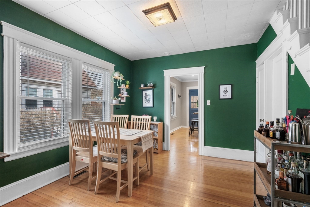 34 Moffatt Road, Unit 34 Salem, MA 01970 - Photo 9 of 23 a dining room with furniture window and wooden floor