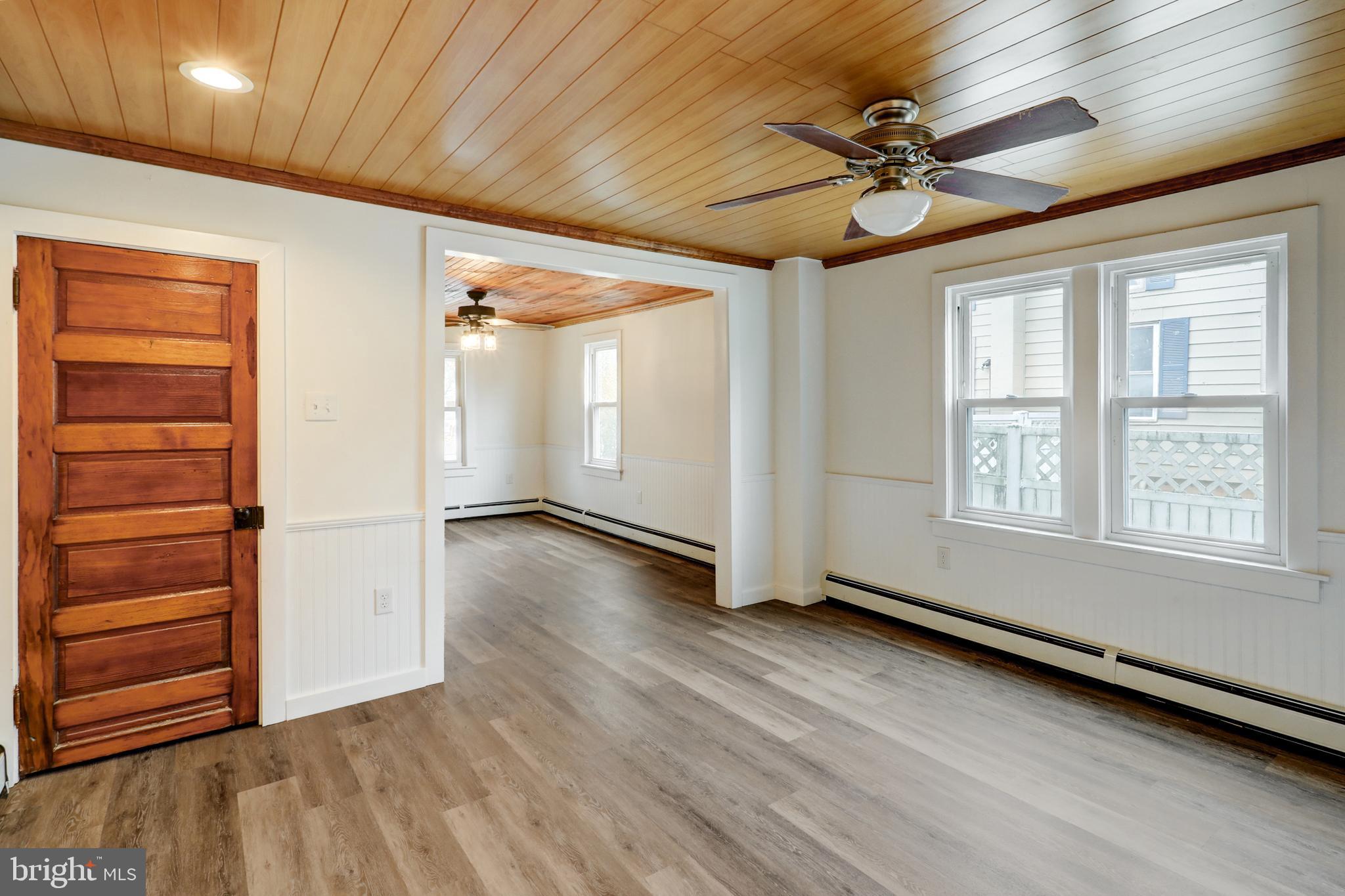 157 South Wolf Street Manheim, PA 17545 - Photo 12 of 23 a view of an empty room with a window and wooden floor