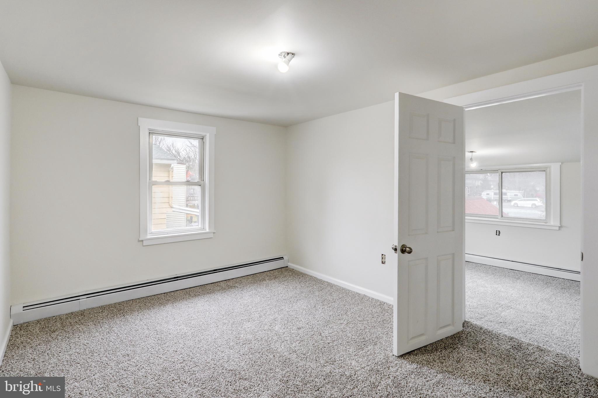 157 South Wolf Street Manheim, PA 17545 - Photo 19 of 23 an empty room with a empty space and windows