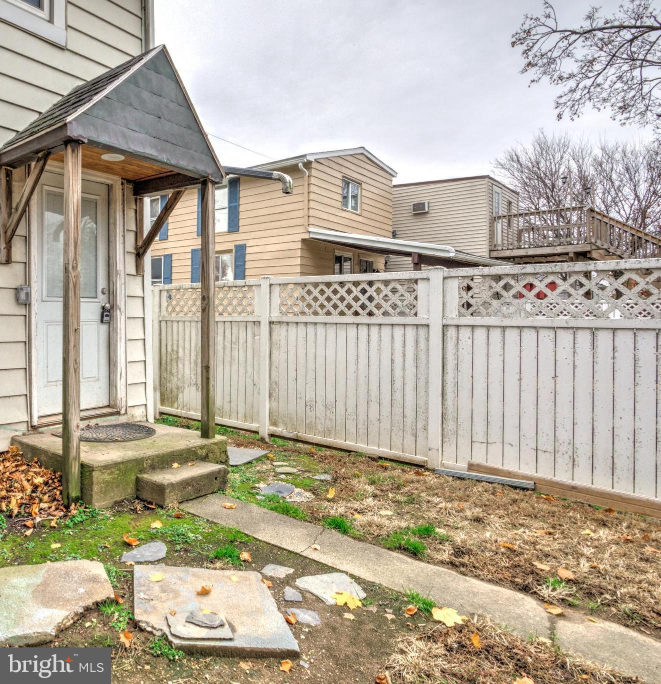 157 South Wolf Street Manheim, PA 17545 - Photo 5 of 23 a front view of a house with a garden and plants