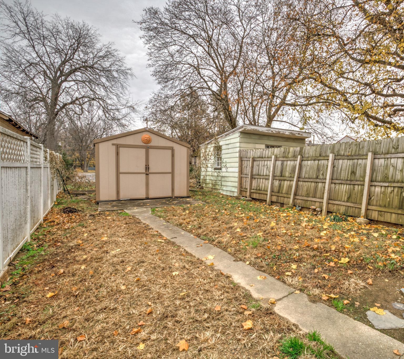 157 South Wolf Street Manheim, PA 17545 - Photo 6 of 23 a front view of a house with a yard and garage