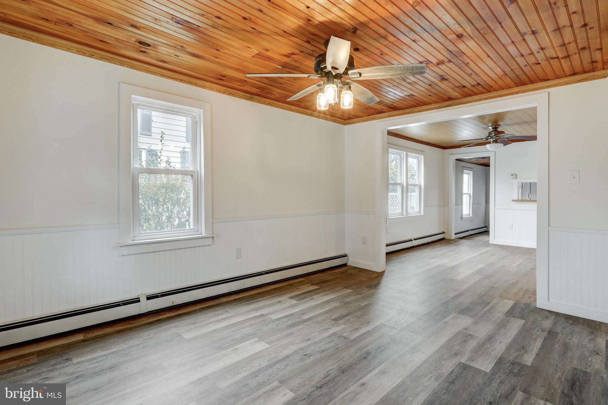 157 South Wolf Street Manheim, PA 17545 - Photo 9 of 23 a view of an empty room with a window and wooden floor