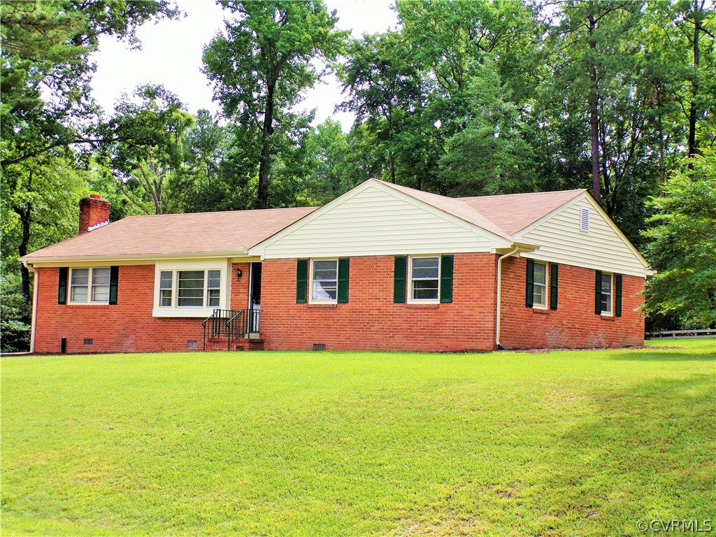 3651 Markey Road Midlothian, VA 23112 - Photo 1 of 21 a front view of a house with a yard and trees