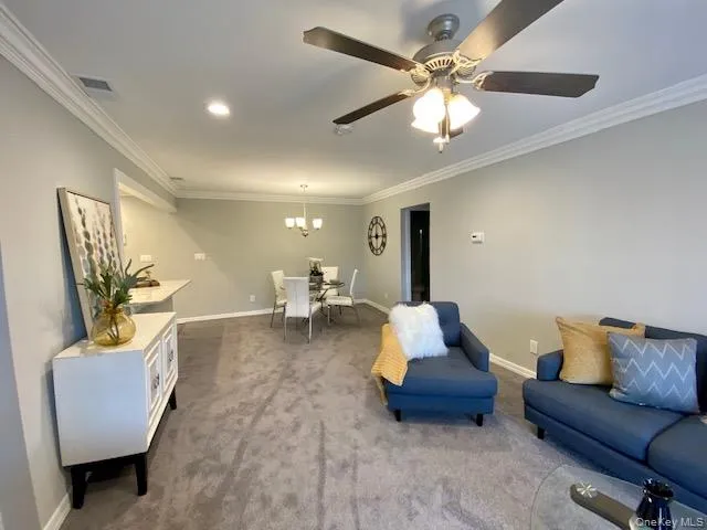 a living room with furniture and a couch