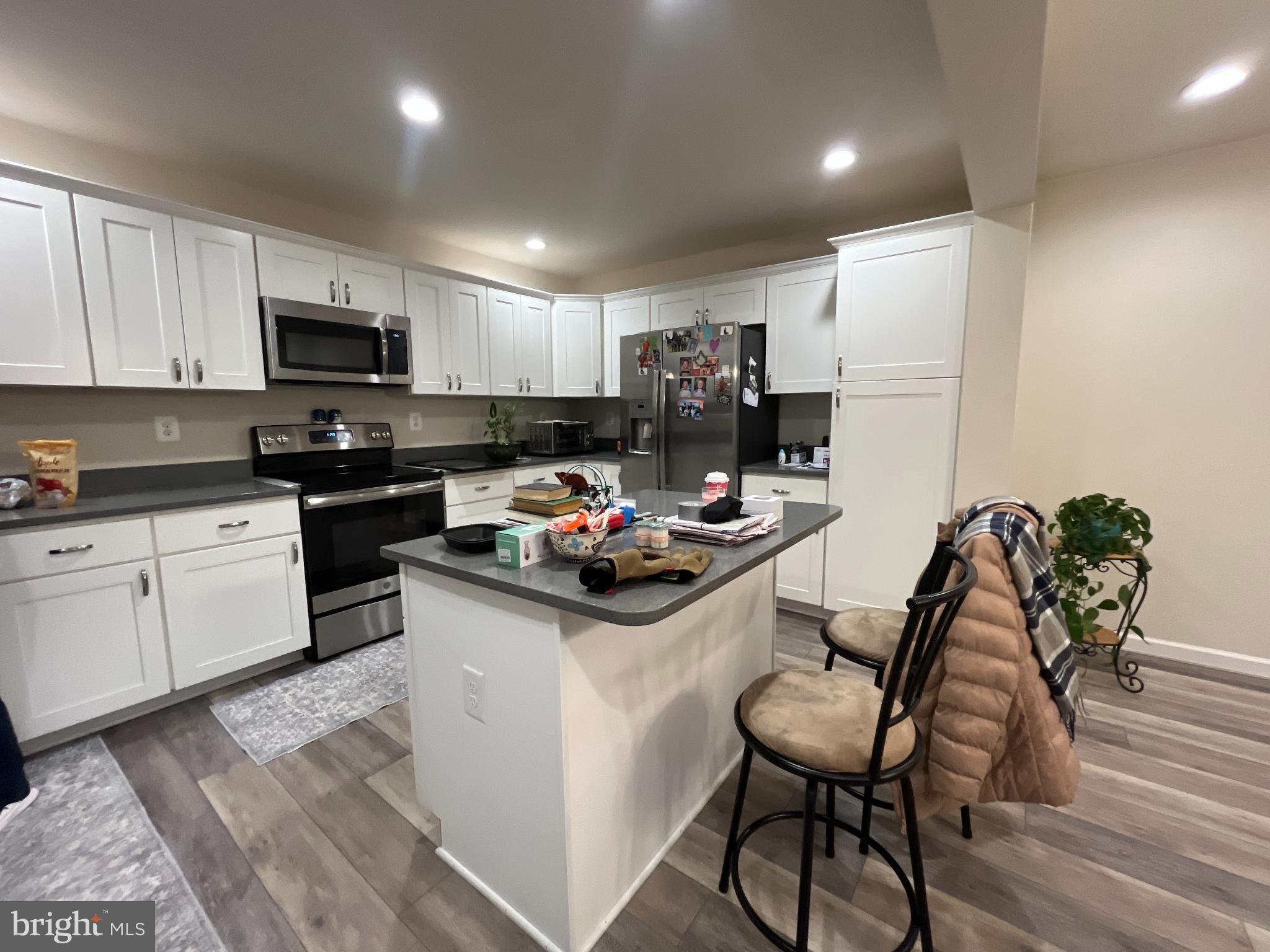 13046 Monterey Lane Blue Ridge Summit, PA 17214 - Photo 26 of 32 Modern kitchen with sleek cabinetry and style.