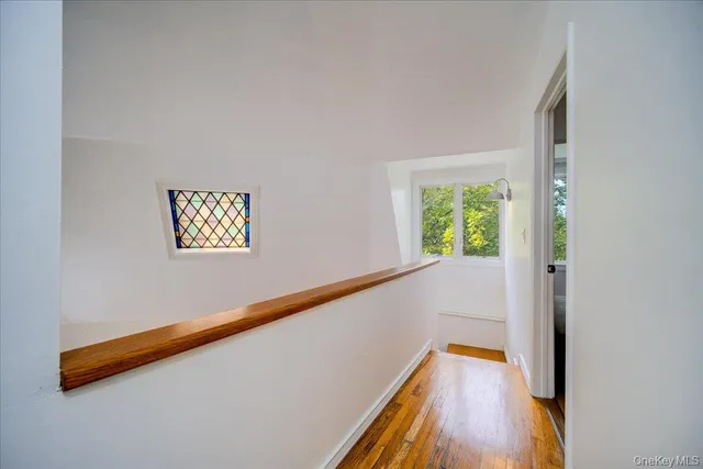 a bed room with a bed and a night stand