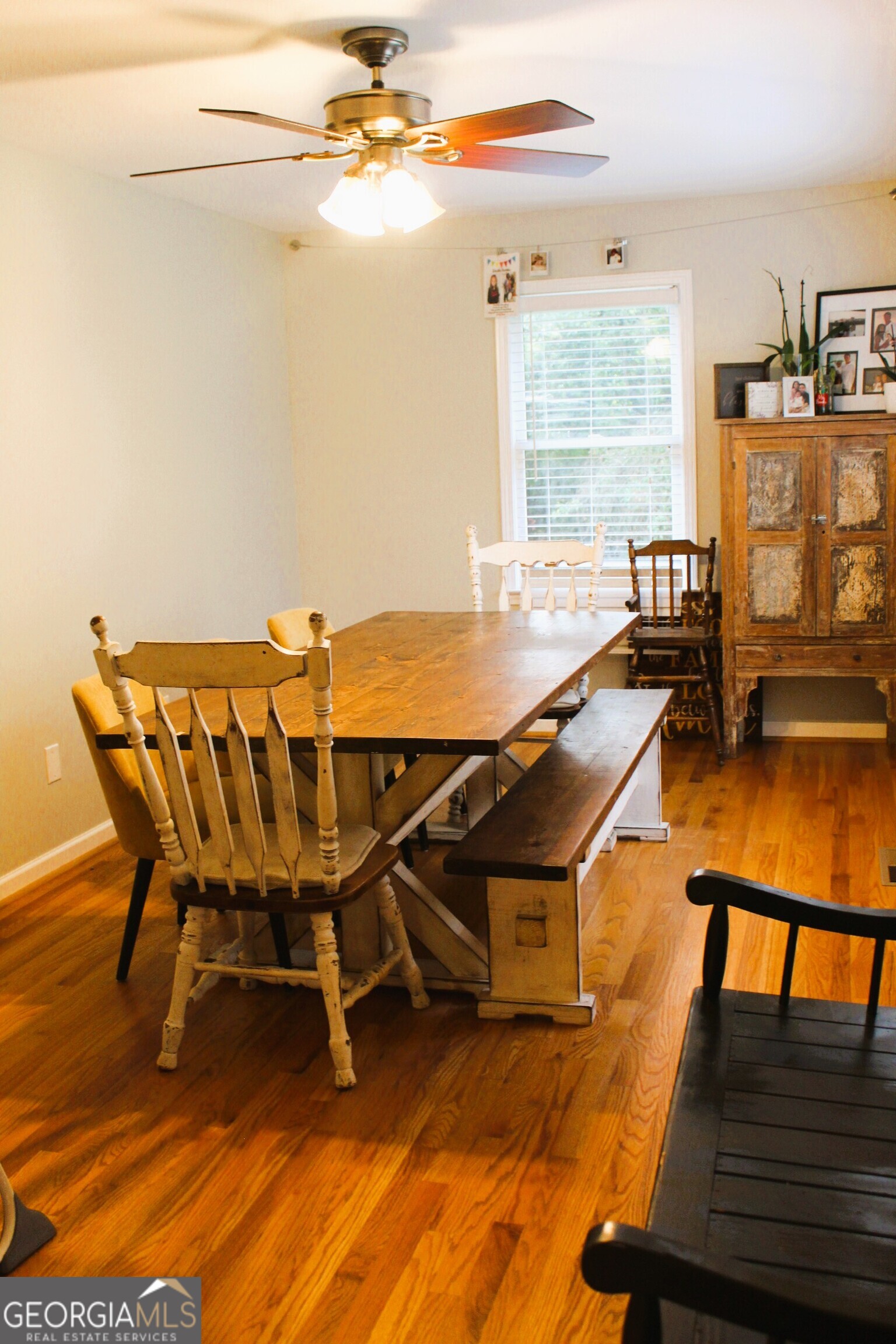 2796 Barbon Road Monroe, GA 30656 - Photo 20 of 36 a balcony with chairs and wooden floor