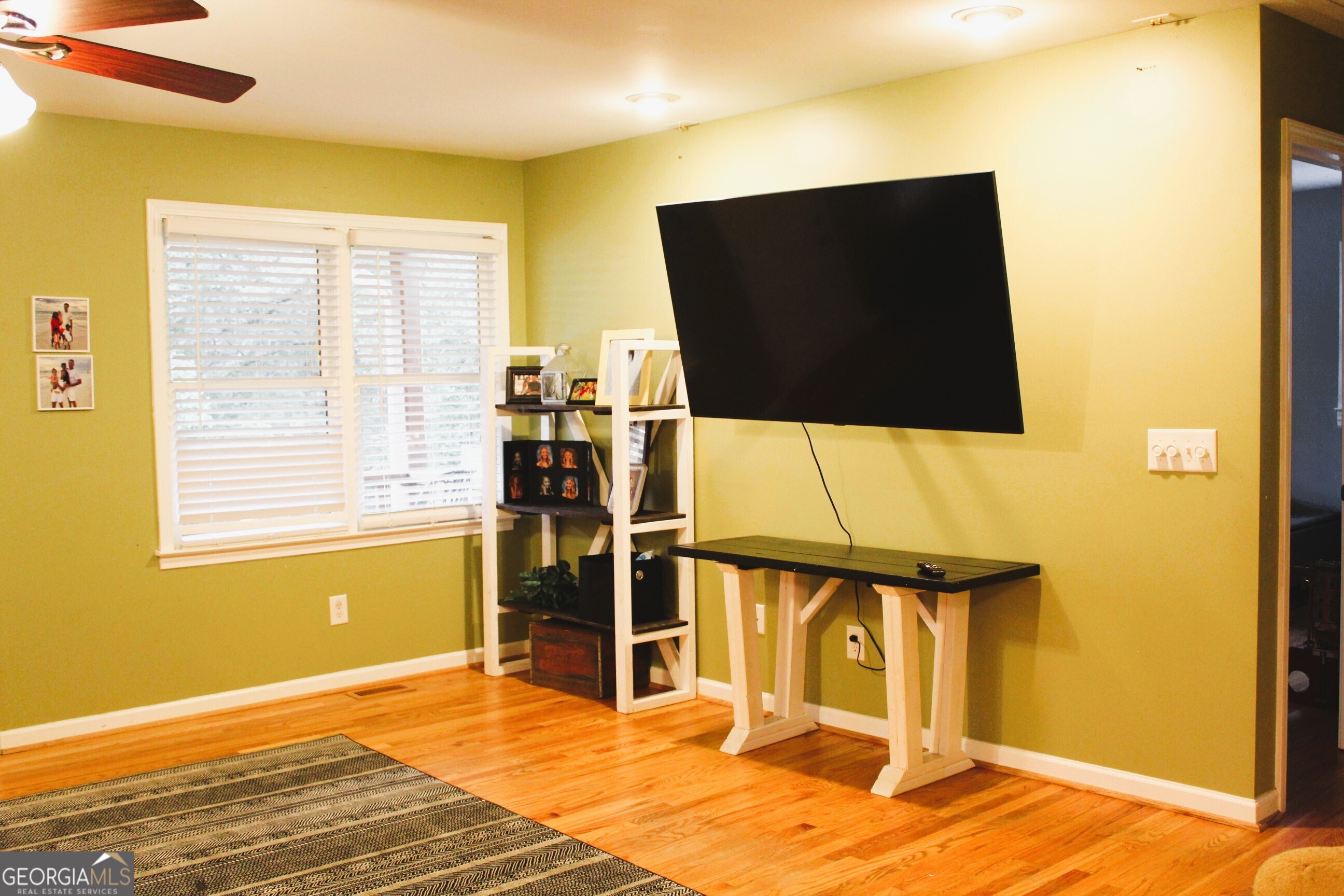2796 Barbon Road Monroe, GA 30656 - Photo 24 of 36 a view of a livingroom with furniture and an empty room