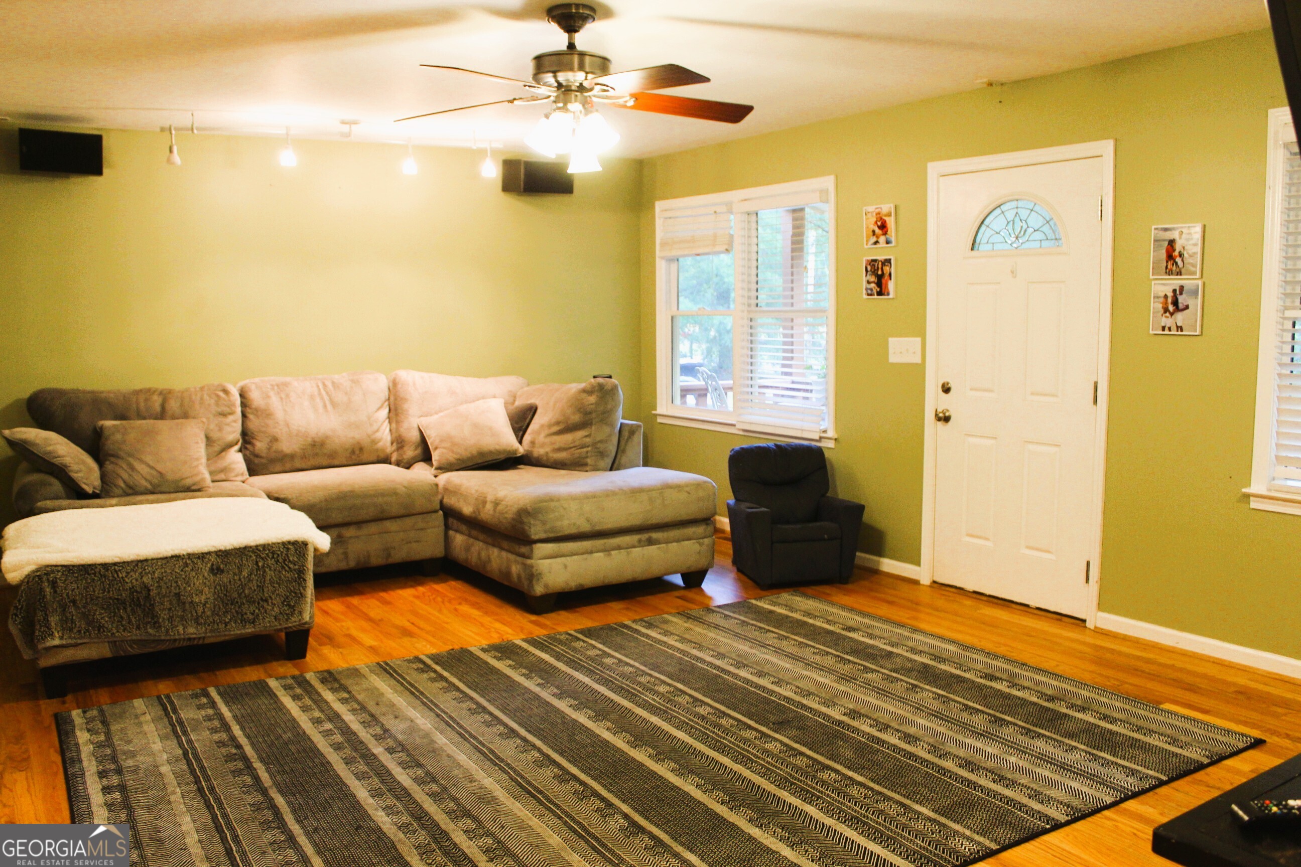 2796 Barbon Road Monroe, GA 30656 - Photo 25 of 36 a living room with furniture and a rug