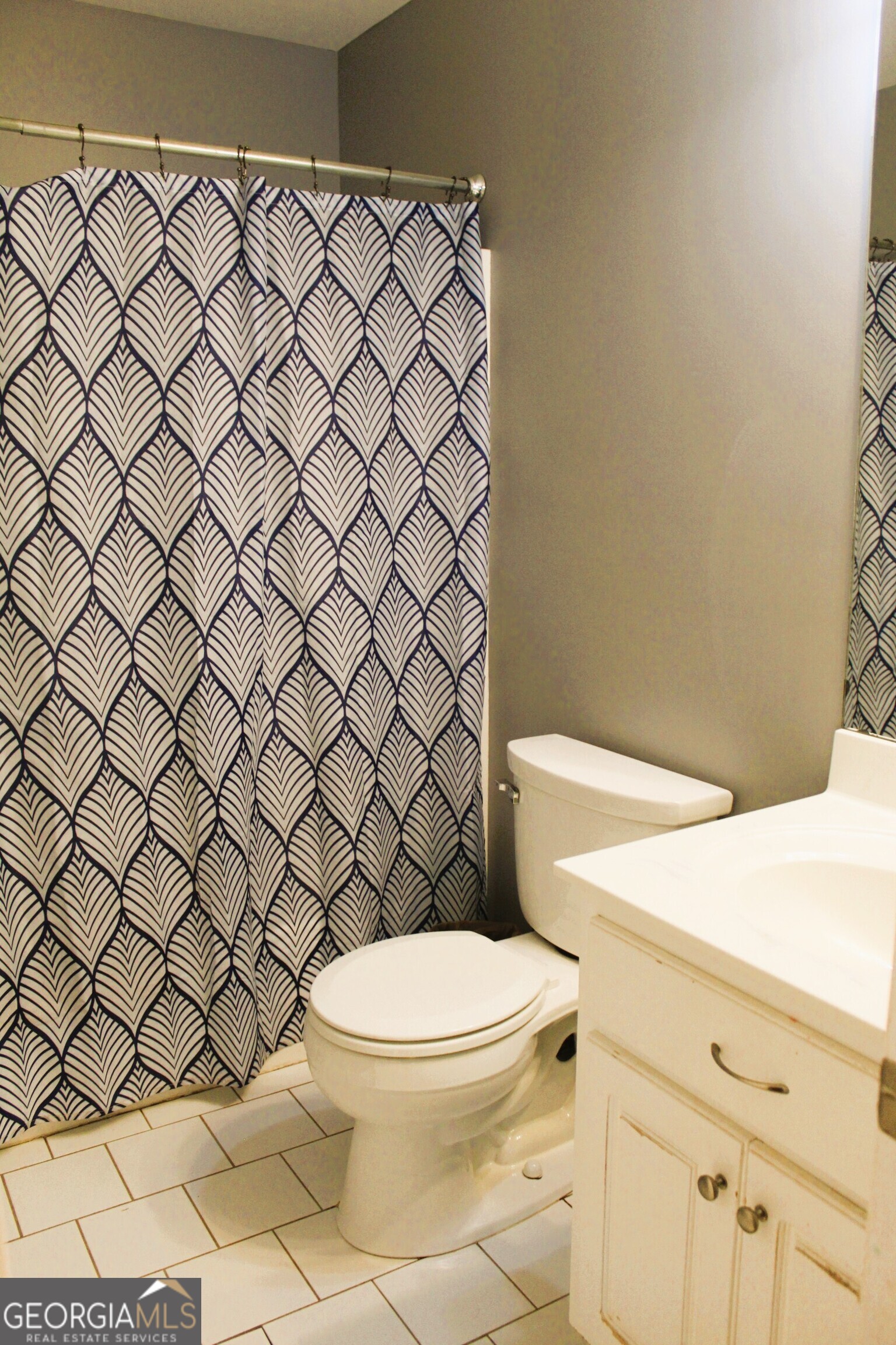 2796 Barbon Road Monroe, GA 30656 - Photo 34 of 36 a white toilet and a sink