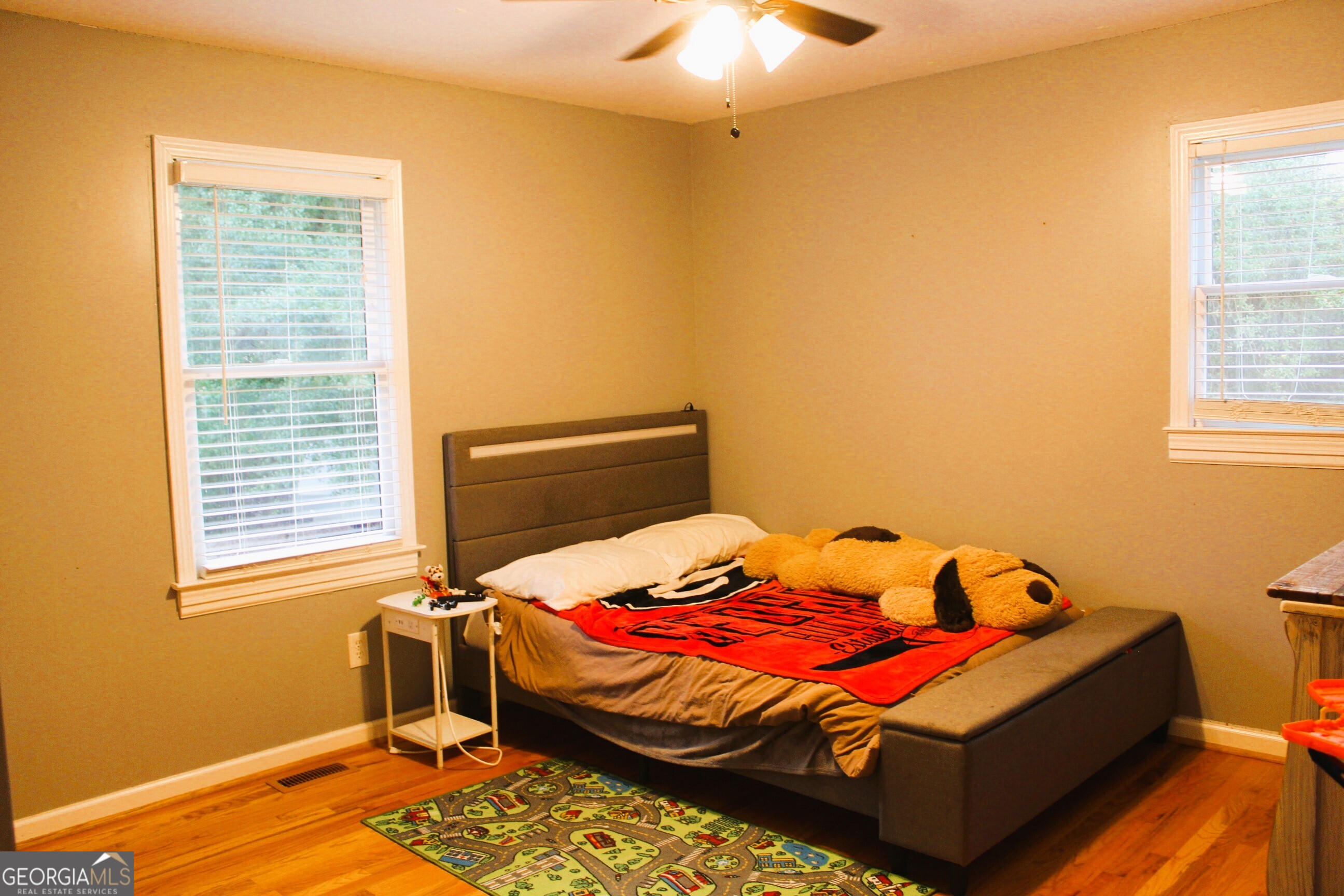 2796 Barbon Road Monroe, GA 30656 - Photo 35 of 36 a bedroom with a bed and a window