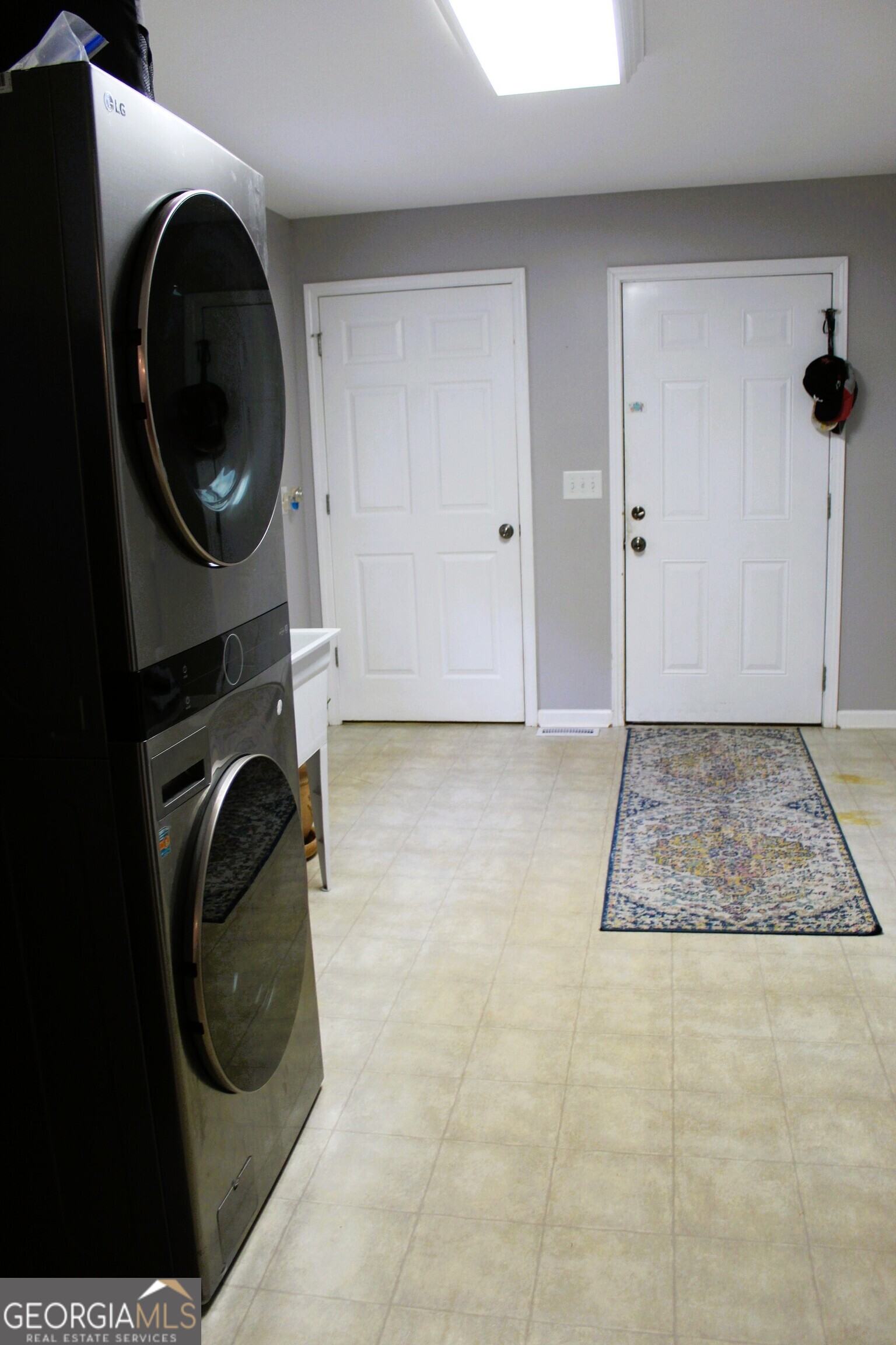 2796 Barbon Road Monroe, GA 30656 - Photo 36 of 36 a view of a storage & utility room with washer and dryer