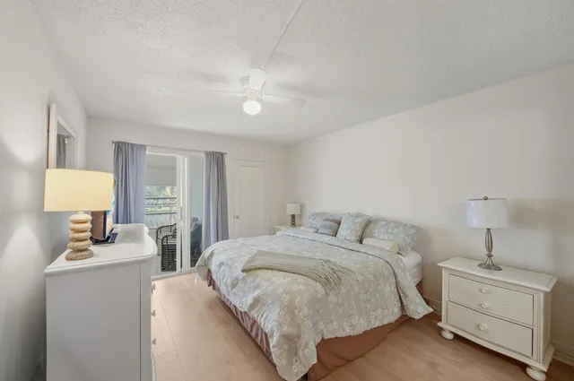 a bed room with a bed and a lamp