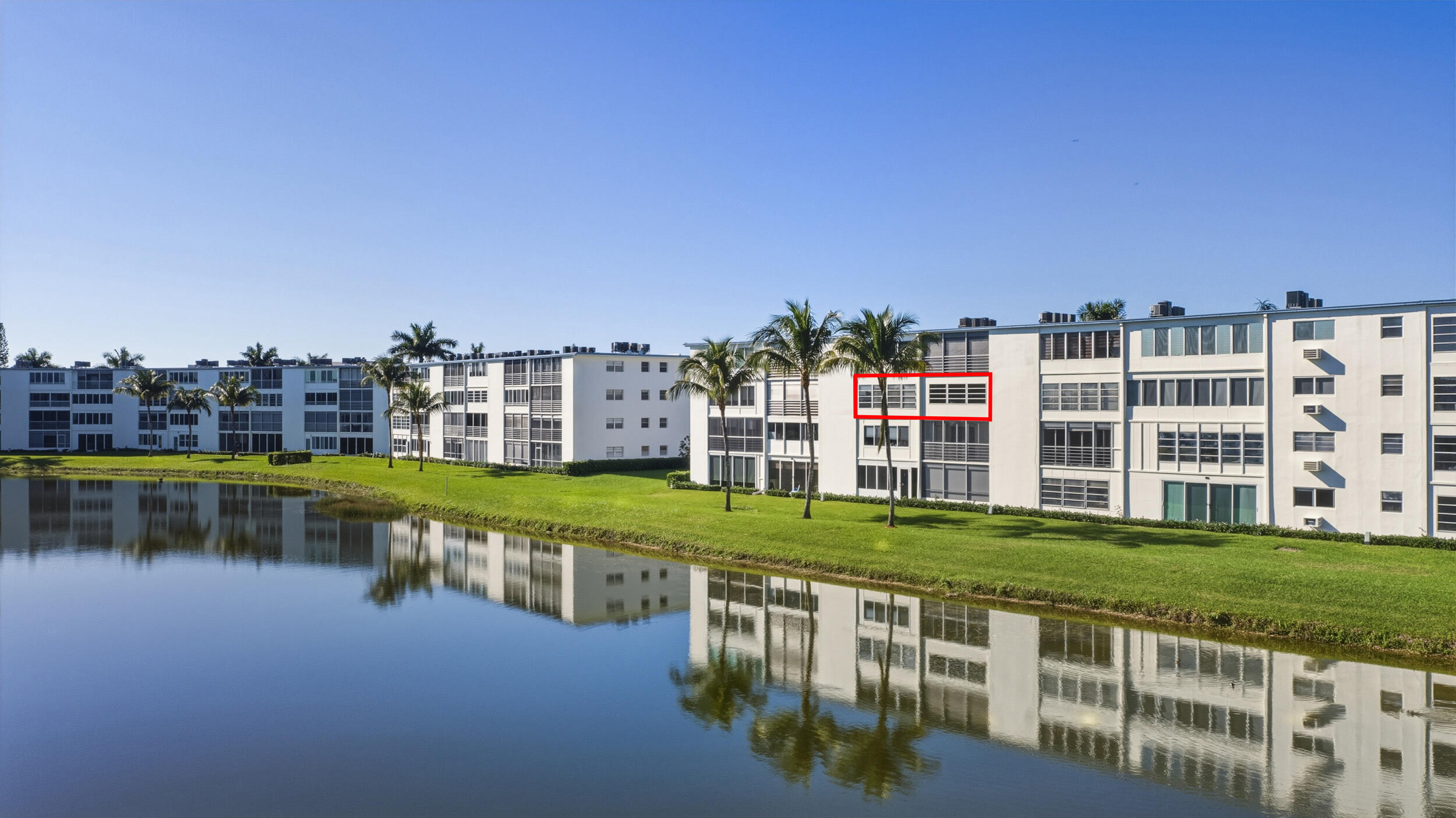 3063 Yarmouth C Boca Raton, FL 33434 - Photo 6 of 40 a view of building with lake view