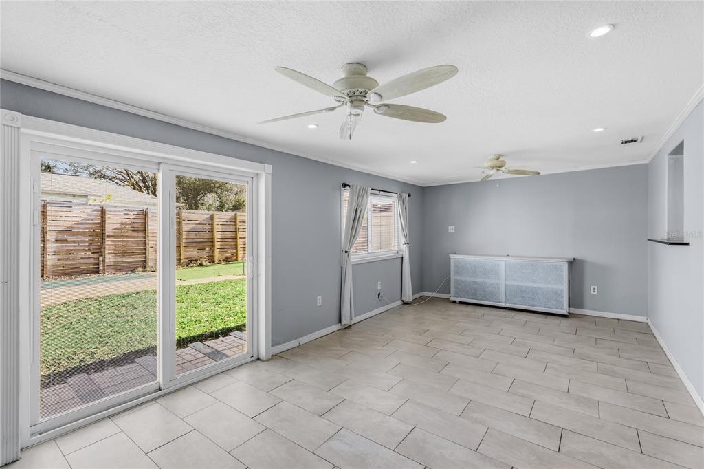 545 Bluebell Road Venice, FL 34293 - Photo 17 of 36 a view of an empty room with a window