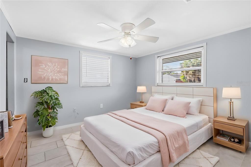 545 Bluebell Road Venice, FL 34293 - Photo 19 of 36 a bedroom with a bed and a window