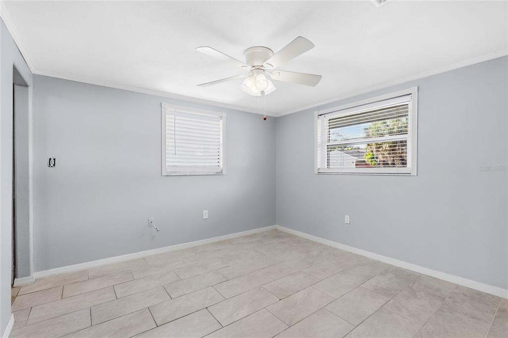 545 Bluebell Road Venice, FL 34293 - Photo 20 of 36 a view of an empty room with a window