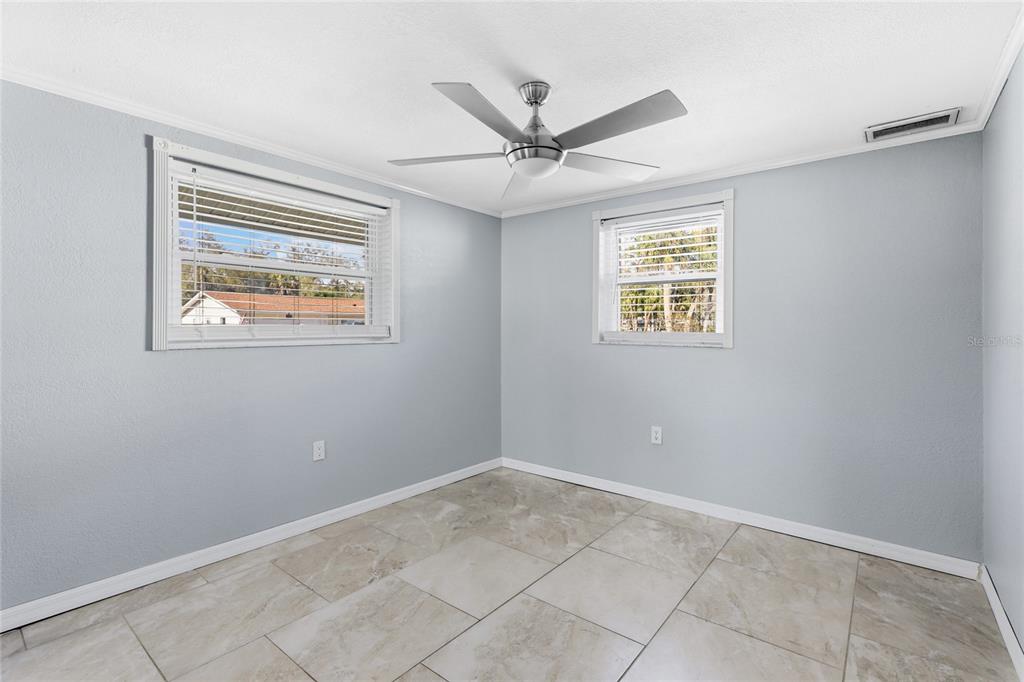 545 Bluebell Road Venice, FL 34293 - Photo 24 of 36 a view of an empty room with a window