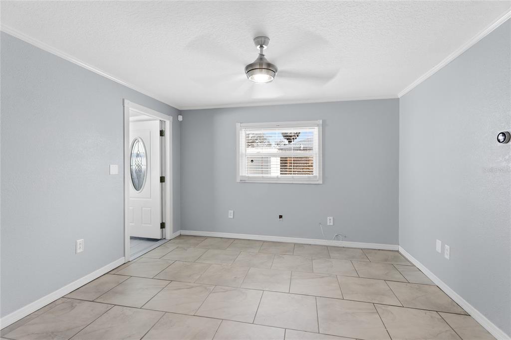 545 Bluebell Road Venice, FL 34293 - Photo 29 of 36 a view of an empty room with a window