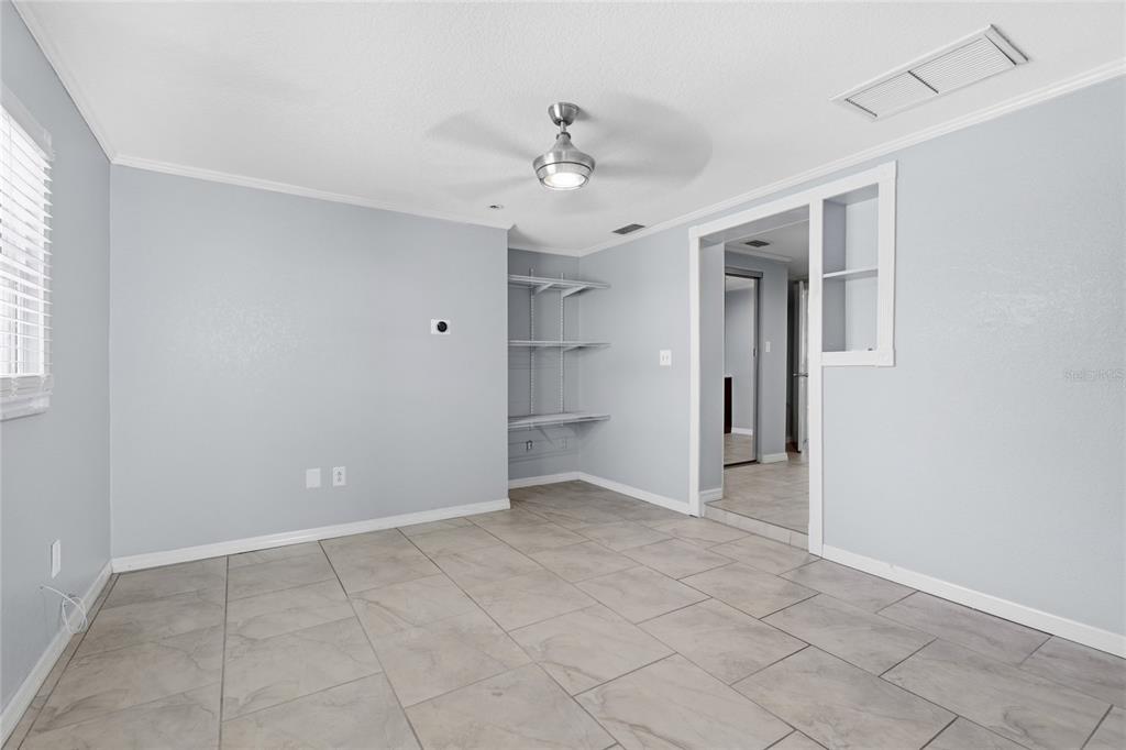 545 Bluebell Road Venice, FL 34293 - Photo 30 of 36 a view of an empty room with a window