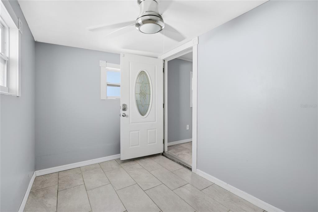 545 Bluebell Road Venice, FL 34293 - Photo 32 of 36 an empty room with windows