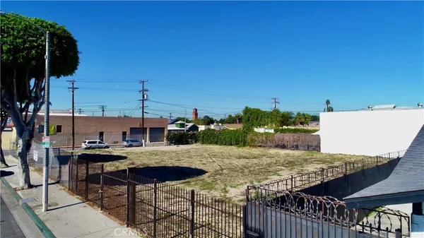 an aerial view of a house with outdoor space