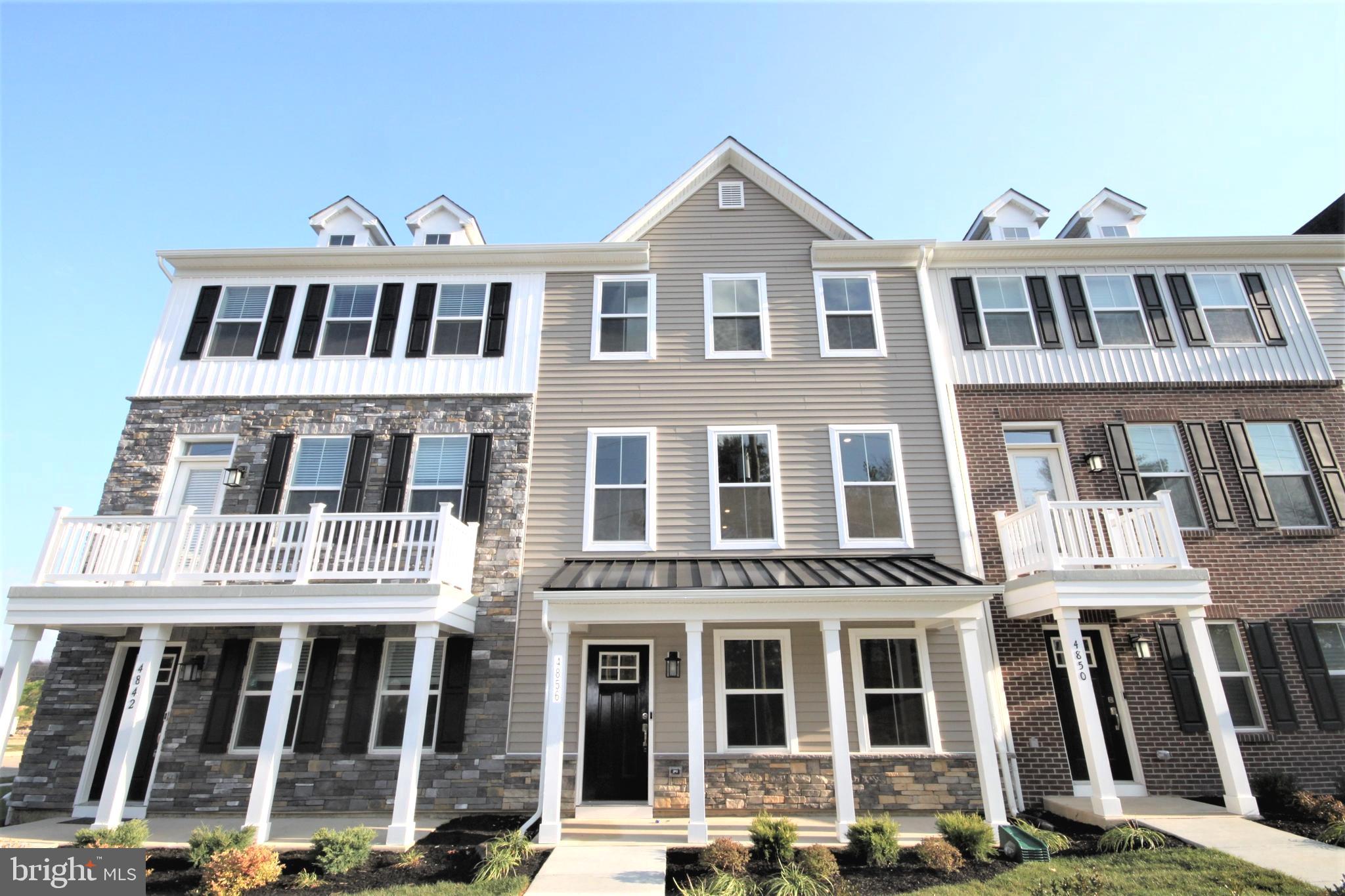 4856 Stump Road Pipersville, PA 18947 - Photo 1 of 35 a front view of a building with glass windows