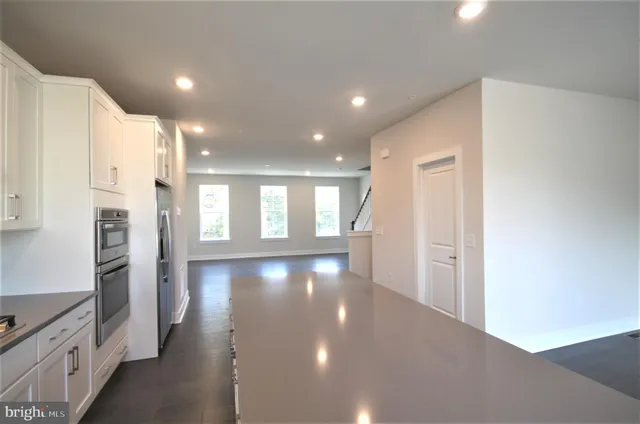 a view of hallway with windows