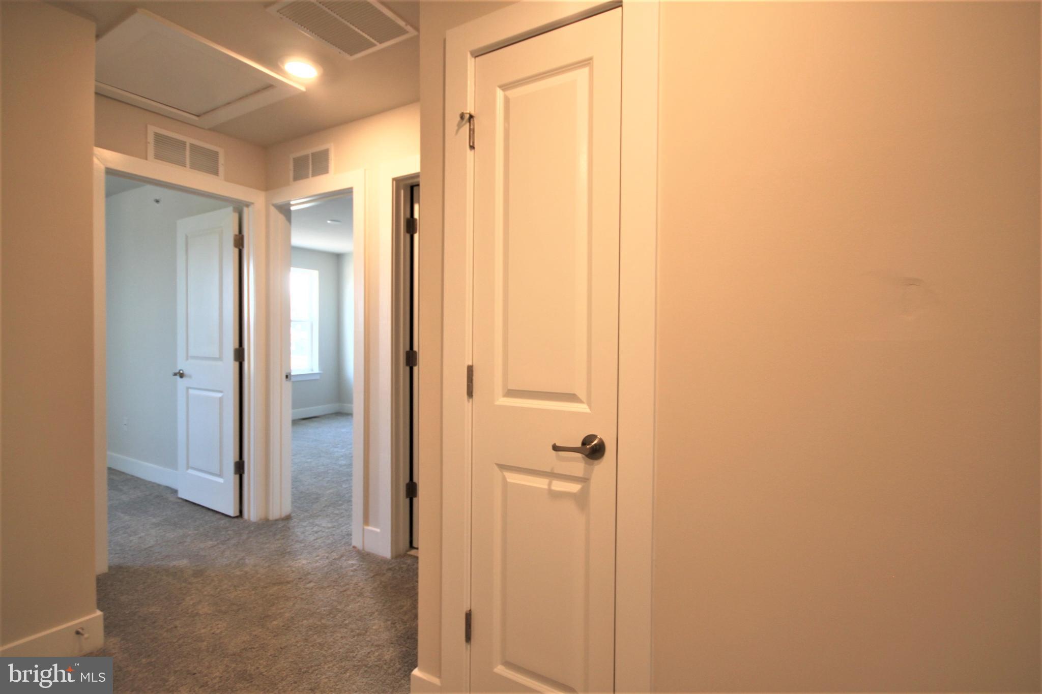 4856 Stump Road Pipersville, PA 18947 - Photo 16 of 35 a view of a bathroom with a glass shower door