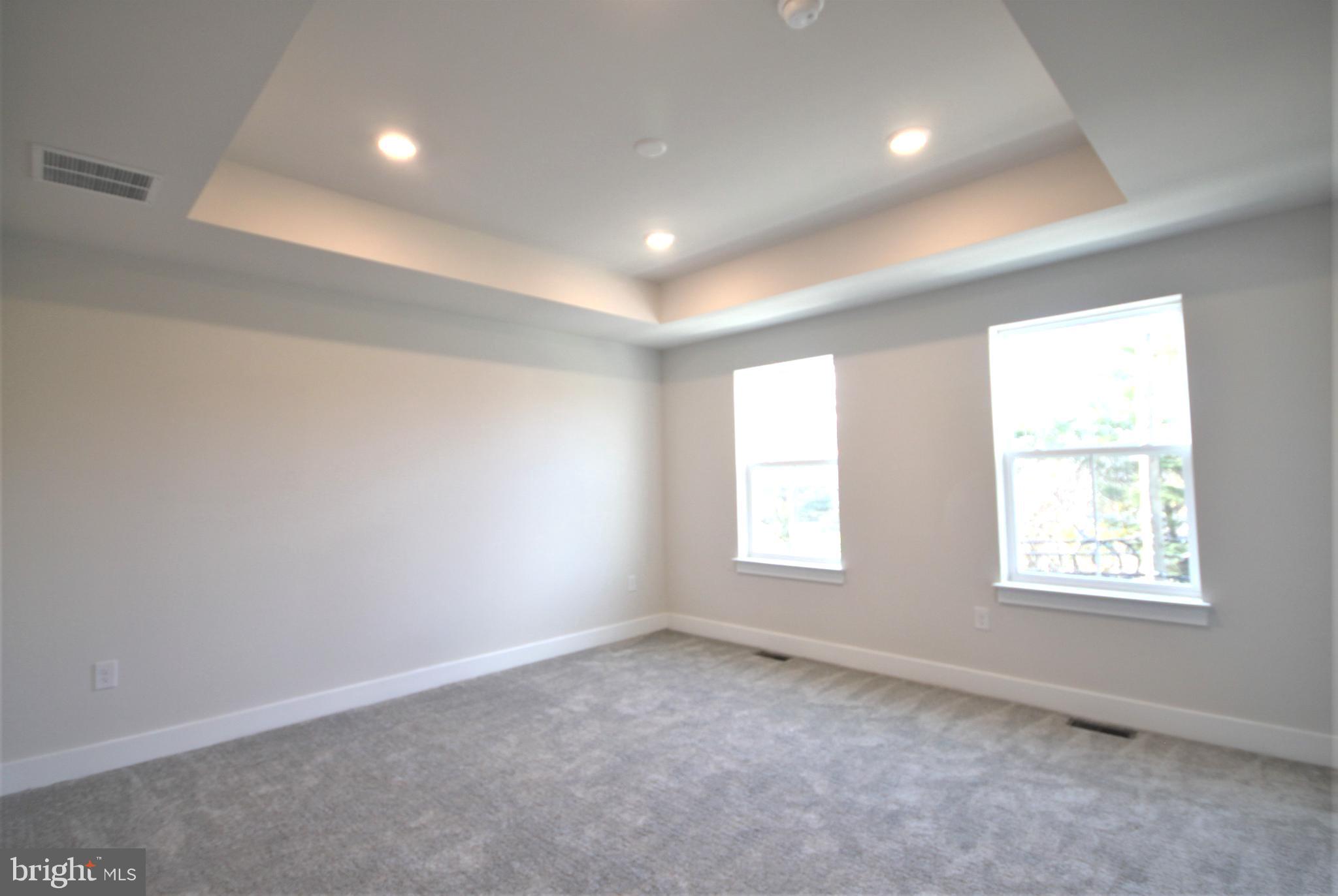 4856 Stump Road Pipersville, PA 18947 - Photo 17 of 35 an empty room with windows