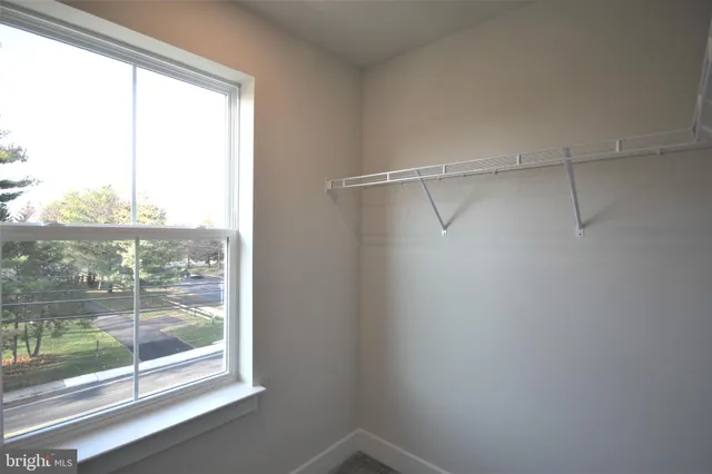 a view of a glass door with a view of the window