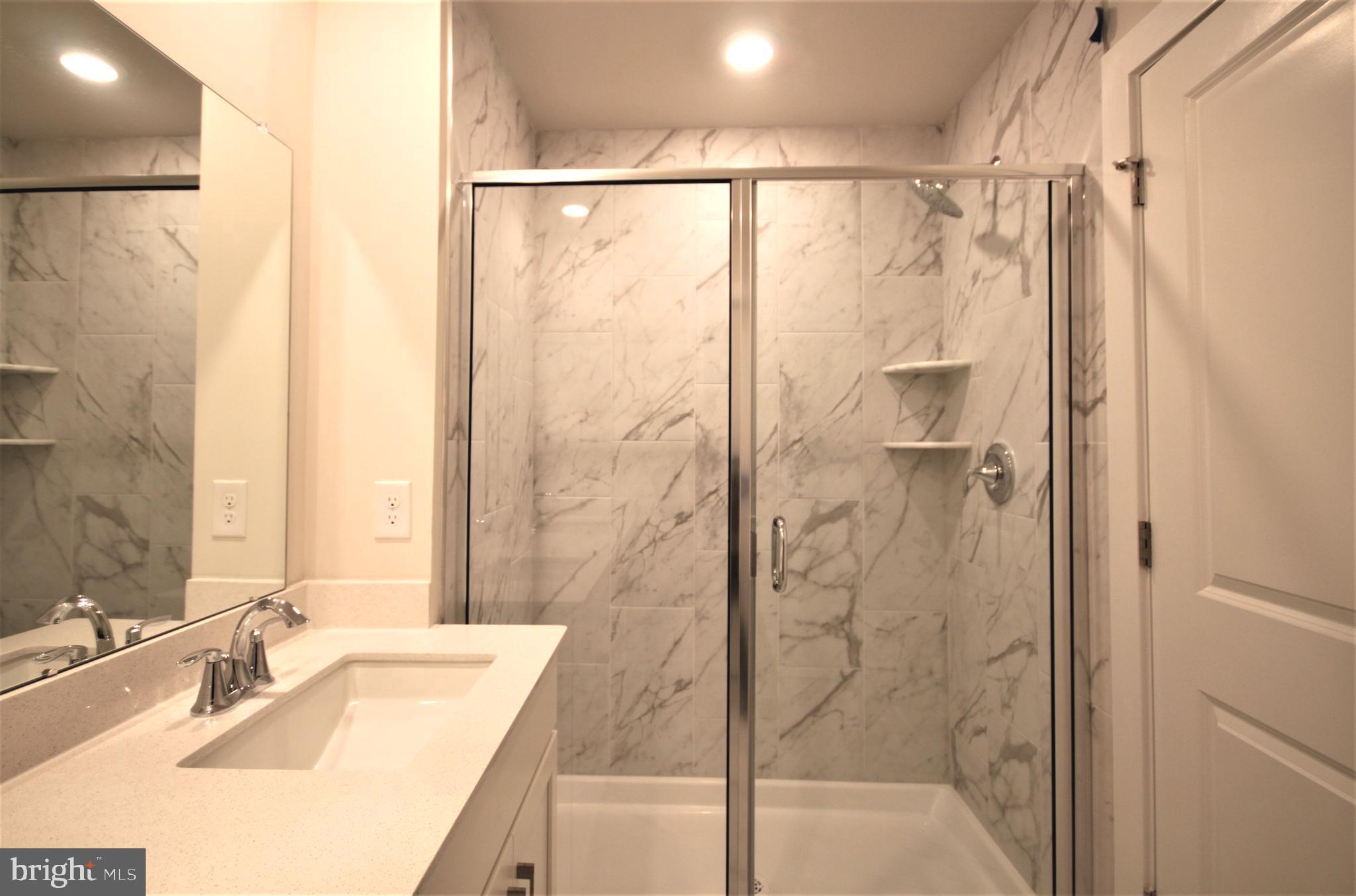 4856 Stump Road Pipersville, PA 18947 - Photo 20 of 35 a bathroom with a shower and a sink