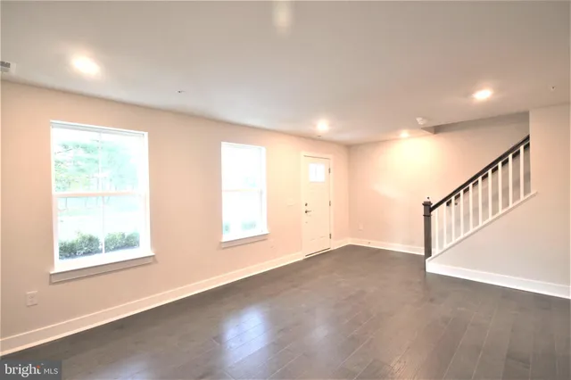 an empty room with windows